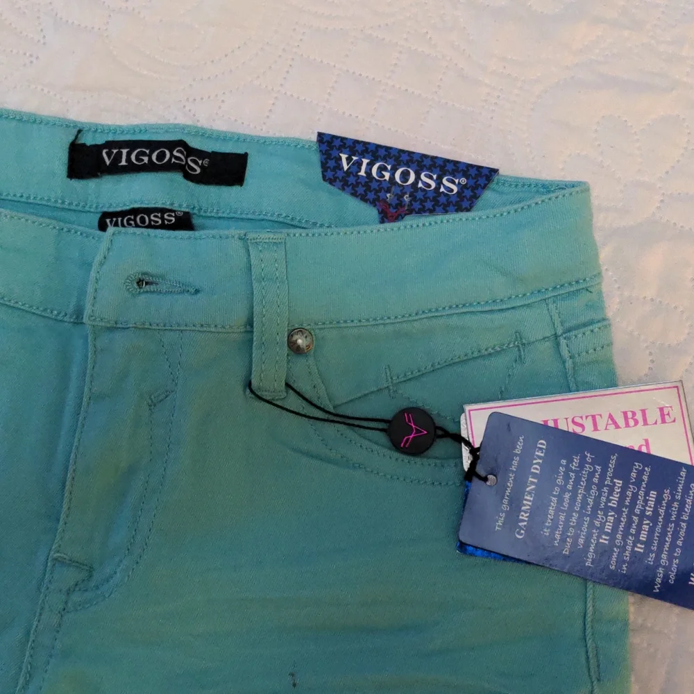 Girls turquoise shorts - sz 14